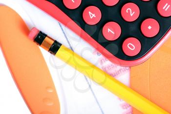 Royalty Free Photo of a Calculator and Pencil