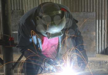 Royalty Free Photo of a Man Welding