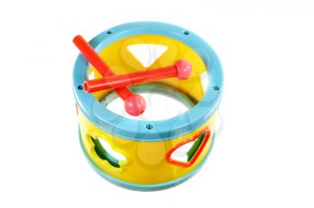 Small toy drum isolated on a white background
