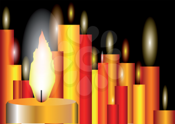 burning candles isolated  on a black background