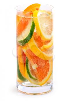 Bubbly beverage with citrus slices isolated on white background