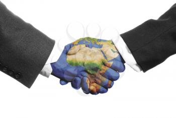 two hands shaking on a white background with a world map