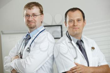 Medical office - doctors posing for team photo.