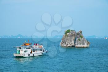 Boat and island in Halong Bay, Vietnam, Southeast Asia