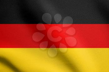 Flag of Germany waving in the wind with detailed fabric texture. German flag.