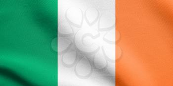 Flag of Ireland waving in the wind with detailed fabric texture. Irish national flag.