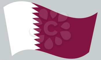 Flag of Qatar waving on gray background. Qatari national flag.