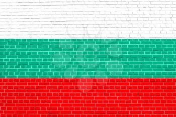 Flag of Bulgaria on brick wall texture background. Bulgarian national flag.