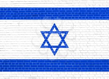 Flag of Israel on brick wall texture background. Israeli national flag.