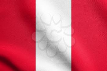 Flag of Peru waving in the wind with detailed fabric texture. Peruvian national flag.
