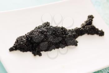 black caviar in the form of fish