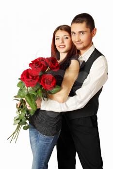 Young couple with bouquet a rose on a white background