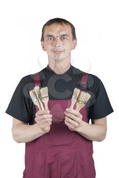 Royalty Free Photo of a House Painter With Brushes