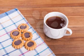 Sweet caramel cookies and a cup of tea.