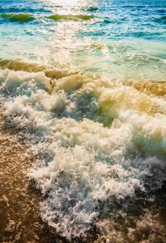 Soft Sea Ocean Waves Wash Over Sand Background. Sunset, Sunrise