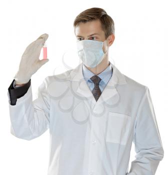 Doctor holding a vial of red liquid. isolated on white background