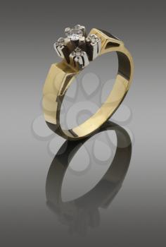 womanish  ring of pure gold with diamonds. with clipping paths