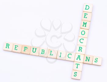Democrats and republicans spelled in a crossword on a white background