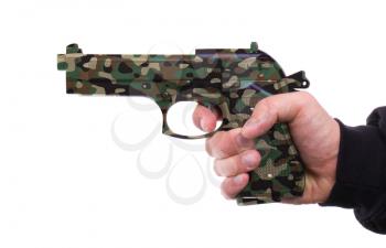 Pistol in hand, isolated on white background, camouflage