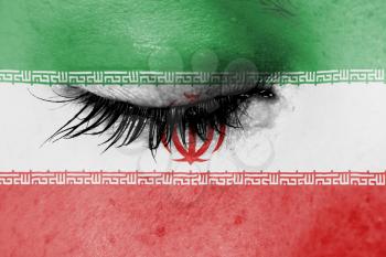 Crying woman, pain and grief concept, flag of Iran