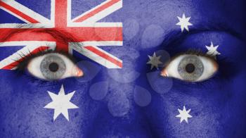 Close up of eyes. Painted face with flag of Australia