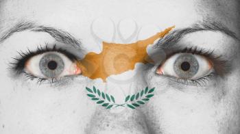 Close up of eyes. Painted face with flag of Cyprus