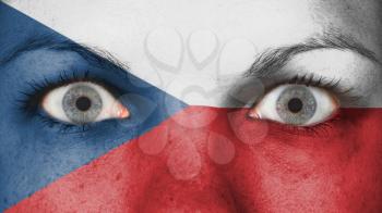 Close up of eyes. Painted face with flag of the Czech Republic