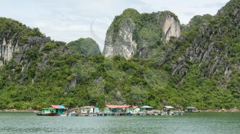 Floating fisherman's village in ha long bay, northern vietnam
