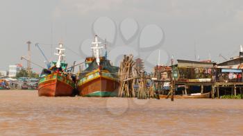 Fishermen boats in a river in the Mekong Delta, Vietnam