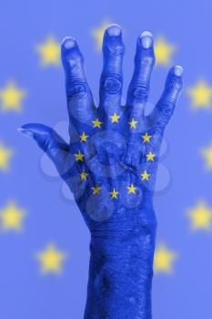 Isolated old hand with flag, European Union, EU