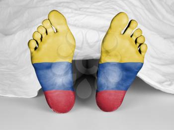 Dead body under a white sheet, flag of Colombia