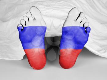 Dead body under a white sheet, flag of Russia