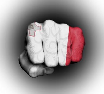 Fist of a man punching, flag of Malta