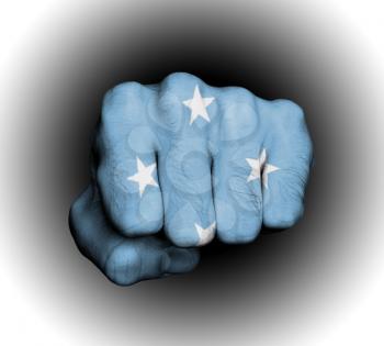 Fist of a man punching, flag of Micronesia