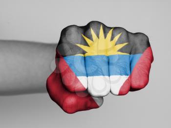Fist of a man punching, flag of ANtigua and Barbuda