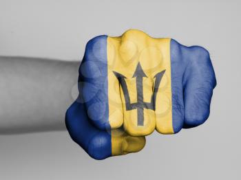 Fist of a man punching, flag of Barbados