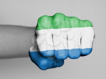 Fist of a man punching, flag of Sierra Leone