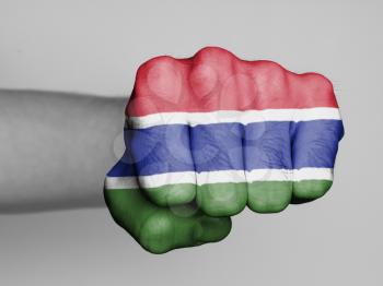 Fist of a man punching, flag of The Gambia