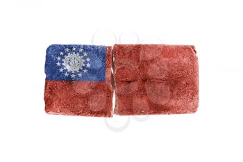 Rough broken brick, isolated on white background, flag of Myanmar