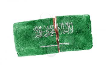 Rough broken brick, isolated on white background, flag of Saudi Arabia