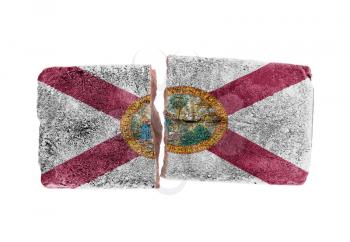 Rough broken brick, isolated on white background, flag of Florida