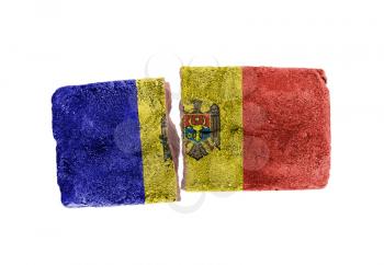 Rough broken brick, isolated on white background, flag of Moldova