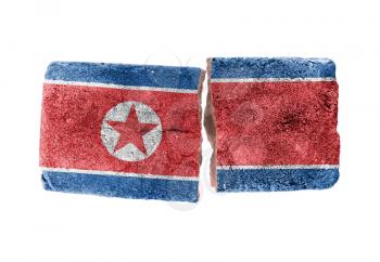 Rough broken brick, isolated on white background, flag of North Korea