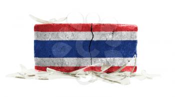 Brick with broken glass, violence concept, flag of Thailand