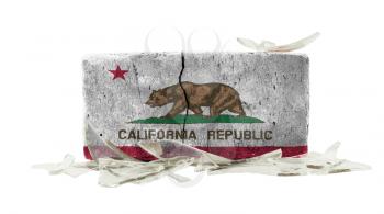 Brick with broken glass, violence concept, flag of California