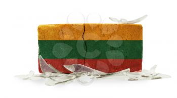 Brick with broken glass, violence concept, flag of Lithuania