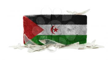 Brick with broken glass, violence concept, flag of Western Sahara