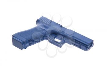 Dirty blue training gun isolated on white, law enforcement