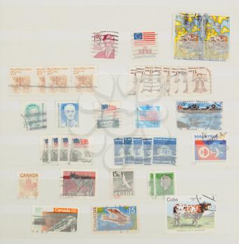 Page with a collection of old American stamps