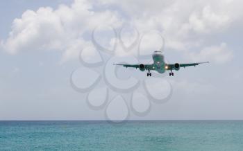 Airplane landing on the Caribbean isle of Saint Martin